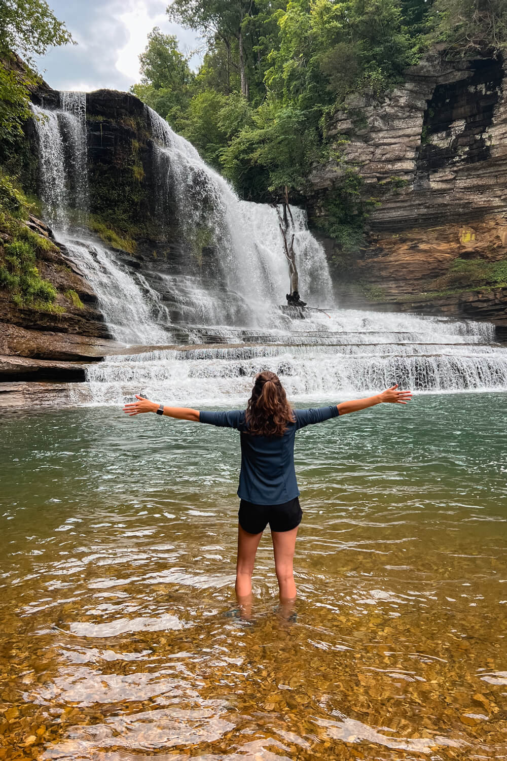 standing in front of cummins falls in tennessee